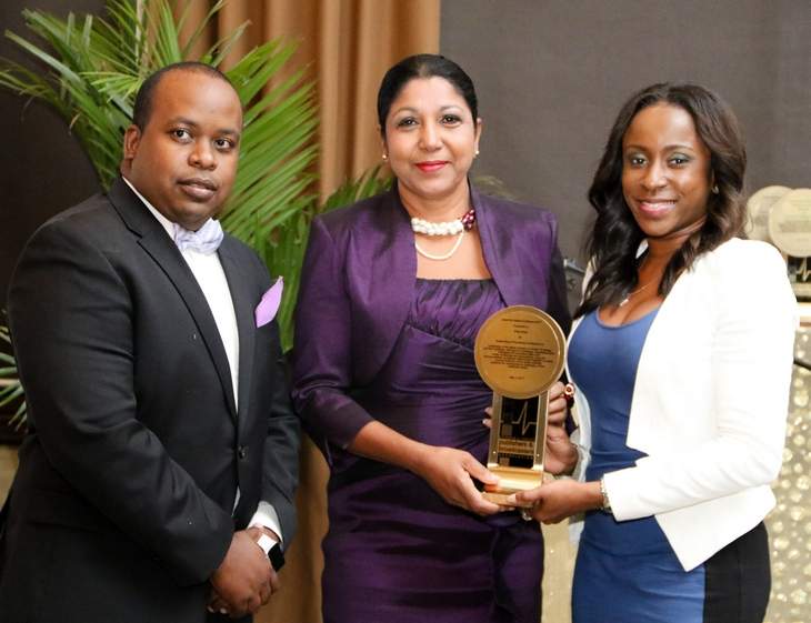 Awarded: Daren Lee Sing, president of the Trinidad and Tobago Publishers and Broadcasters Association (TTPBA), Shida Bolai, centre, awardee for Media ­Excellence, and Tricia Henry, public relations manager of title sponsor Huawei, pose at the TTPBA’s annual dinner and awards for media excellence at Jaffa ­restaurant, Queen’s Park Oval, Port of Spain, on Wednesday night.
